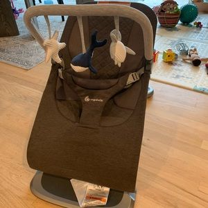 Ergobaby bouncer with infant insert and toy bar